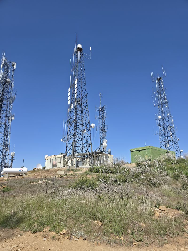 Towers on a summit under a clear sky